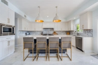 Fully Renovated 4-bed Canal Front Home With Den & Dock | The Shores