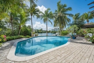 Fully Renovated 4-bed Canal Front Home With Den & Dock | The Shores