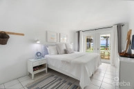 Cayman Kai Sea Lodge #13 Beachfront Condo With Impressive Rental History