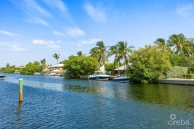 Britannia Kings Court      Canal Front    4 Bed/3  Bath      Plus Boat Dock