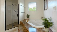 Sun Rose Canal Front Home - North Sound Estates