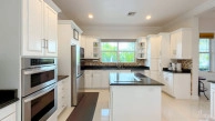 Sun Rose Canal Front Home - North Sound Estates