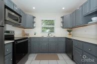 Turnkey 2bed Plus Den End Unit Tropical Haven