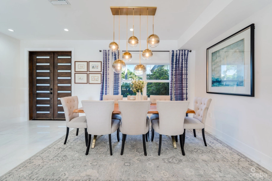 Fully Renovated 4-bed Canal Front Home With Den & Dock | The Shores