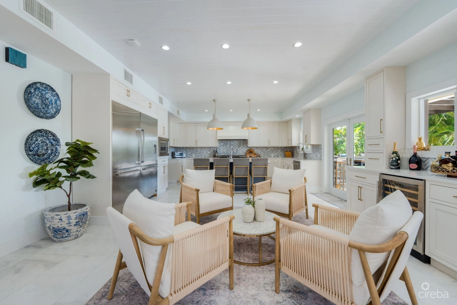 Fully Renovated 4-bed Canal Front Home With Den & Dock | The Shores