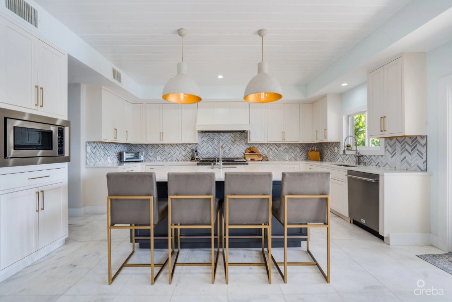 Fully Renovated 4-bed Canal Front Home With Den & Dock | The Shores