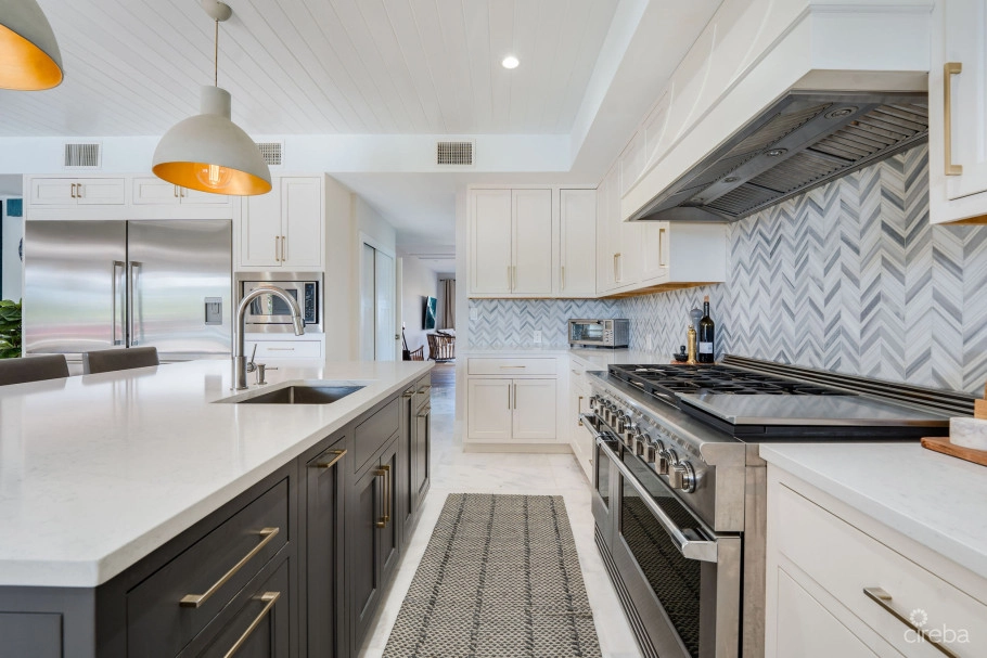Fully Renovated 4-bed Canal Front Home With Den & Dock | The Shores