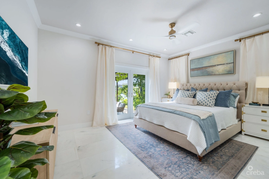 Fully Renovated 4-bed Canal Front Home With Den & Dock | The Shores