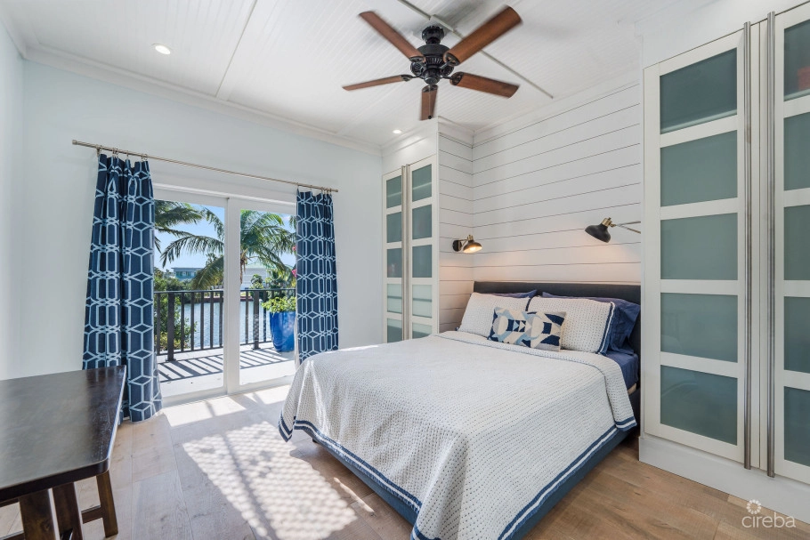 Fully Renovated 4-bed Canal Front Home With Den & Dock | The Shores