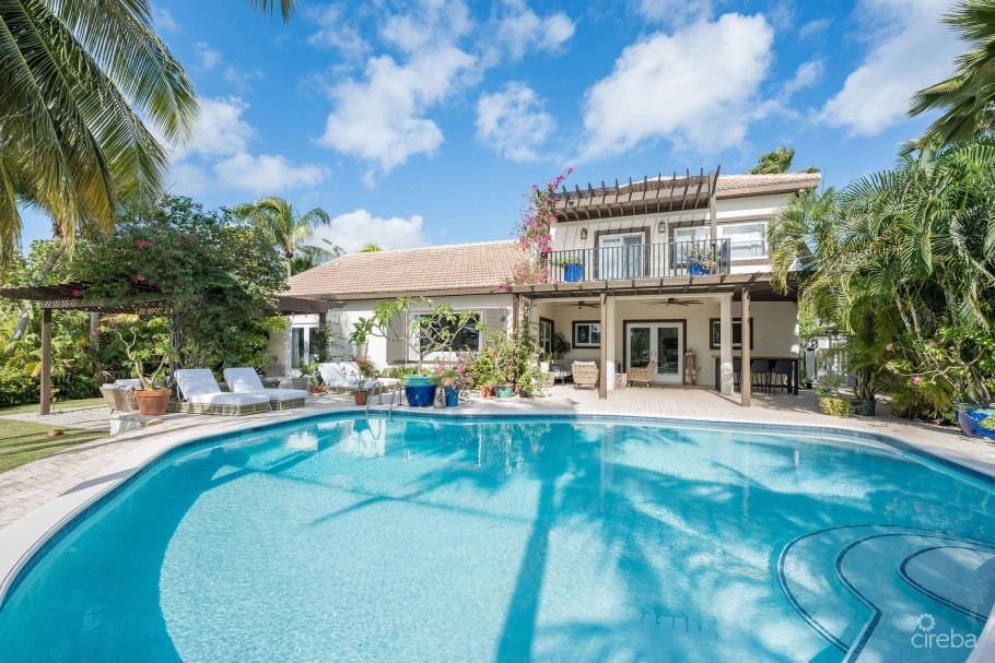 Fully Renovated 4-bed Canal Front Home With Den & Dock | The Shores