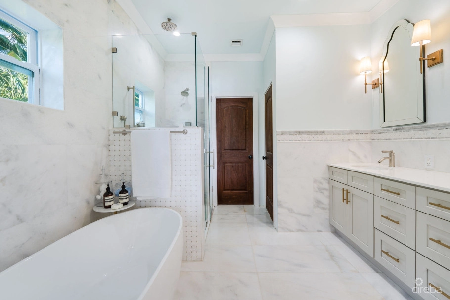 Fully Renovated 4-bed Canal Front Home With Den & Dock | The Shores