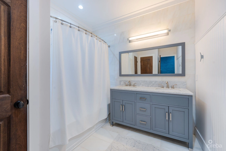 Fully Renovated 4-bed Canal Front Home With Den & Dock | The Shores
