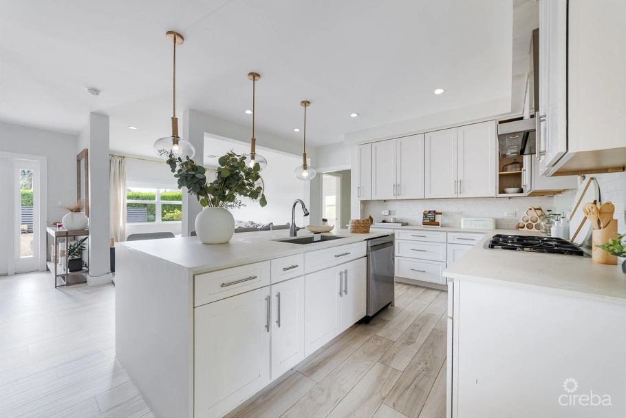Elevated, 6-bedroom  Single Family Home On A Massive Parcel
