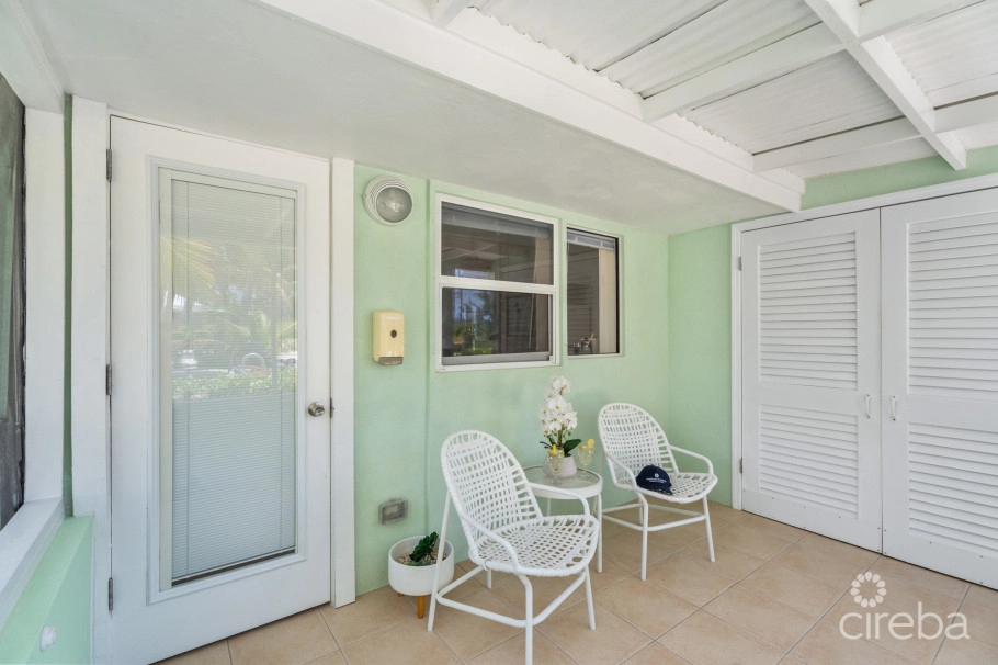 Cayman Kai Sea Lodge #13 Beachfront Condo With Impressive Rental History