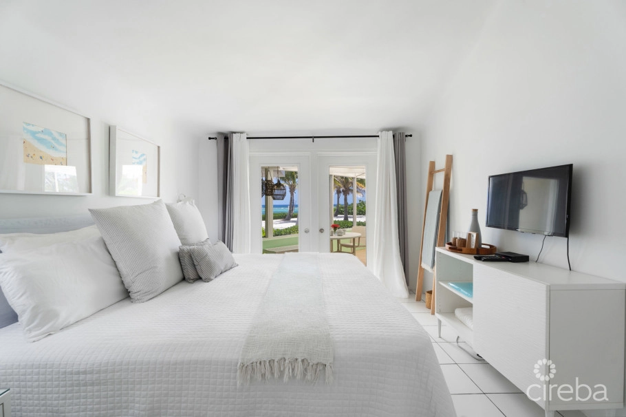 Cayman Kai Sea Lodge #13 Beachfront Condo With Impressive Rental History