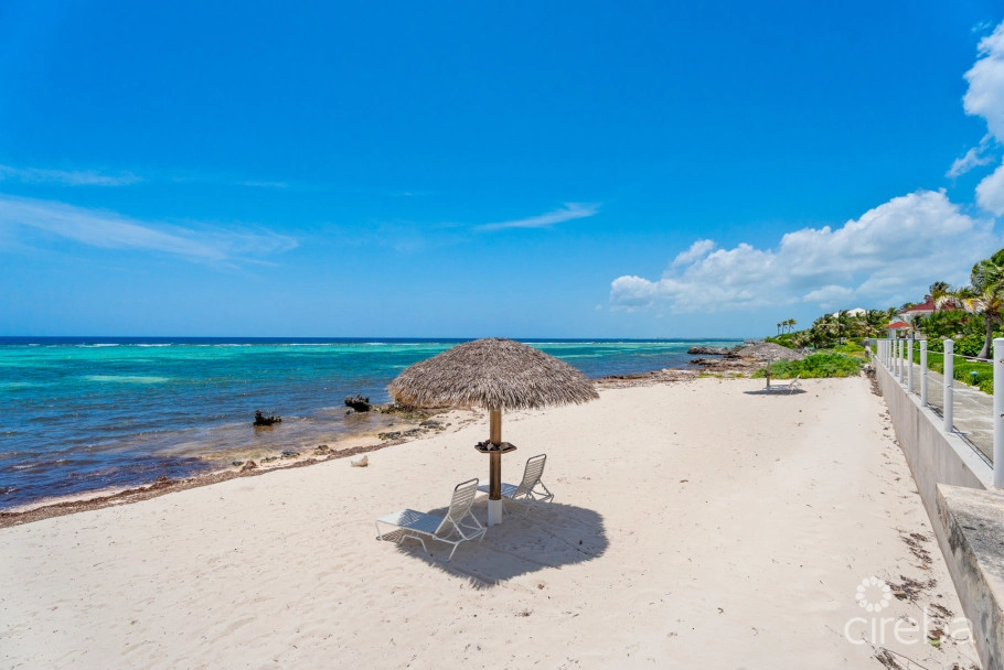 Cayman Kai Sea Lodge #13 Beachfront Condo With Impressive Rental History