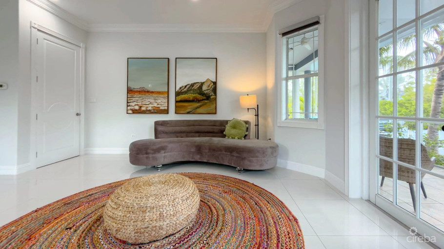 Sun Rose Canal Front Home - North Sound Estates