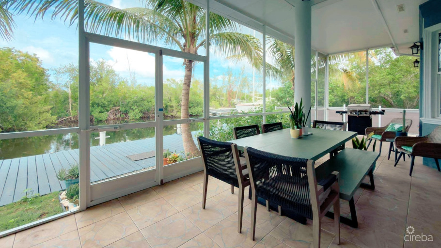 Sun Rose Canal Front Home - North Sound Estates