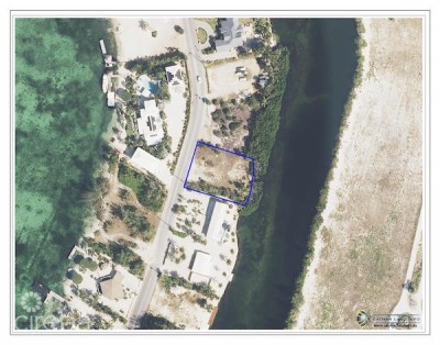 CAYMAN KAI CANAL FRONT LOT W/ APPROVED PLANS - WATER CAY ROAD