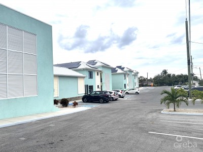 INCOME-PRODUCING RESIDENTIAL PORTFOLIO --4 STUDIOS IN WEST BAY