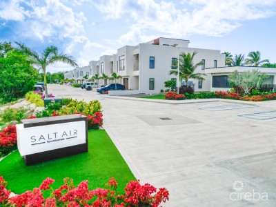 MODERN 2-BEDROOM + DEN TOWNHOME IN SALT AIR – GATED LIVING IN WEST BAY