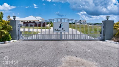 MUSTIQUE COVE LOT WITH DOC IN A PRIVATE GATED COMMUNITY