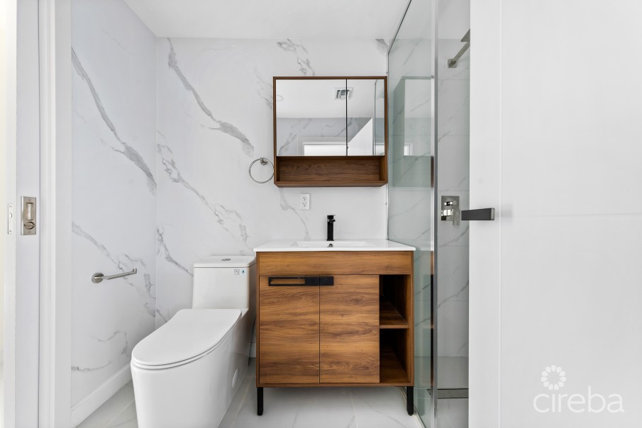 ARZA WEST BAY I5. 1- BED END UNIT. MOVE-IN READY - INCLUSIVE OF A CI$ 14,000 FURNITURE PACKAGE - Image 7