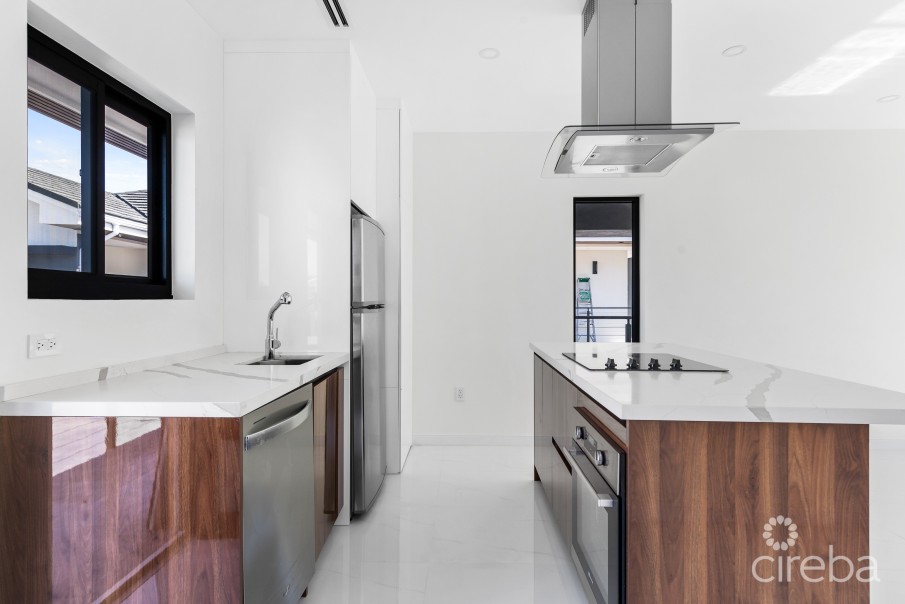 ARZA WEST BAY I5. 1- BED END UNIT. MOVE-IN READY - INCLUSIVE OF A CI$ 14,000 FURNITURE PACKAGE - Image 2