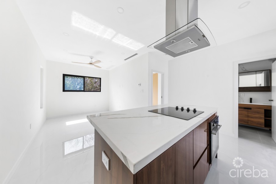 ARZA WEST BAY I5. 1- BED END UNIT. MOVE-IN READY - INCLUSIVE OF A CI$ 14,000 FURNITURE PACKAGE - Image 1