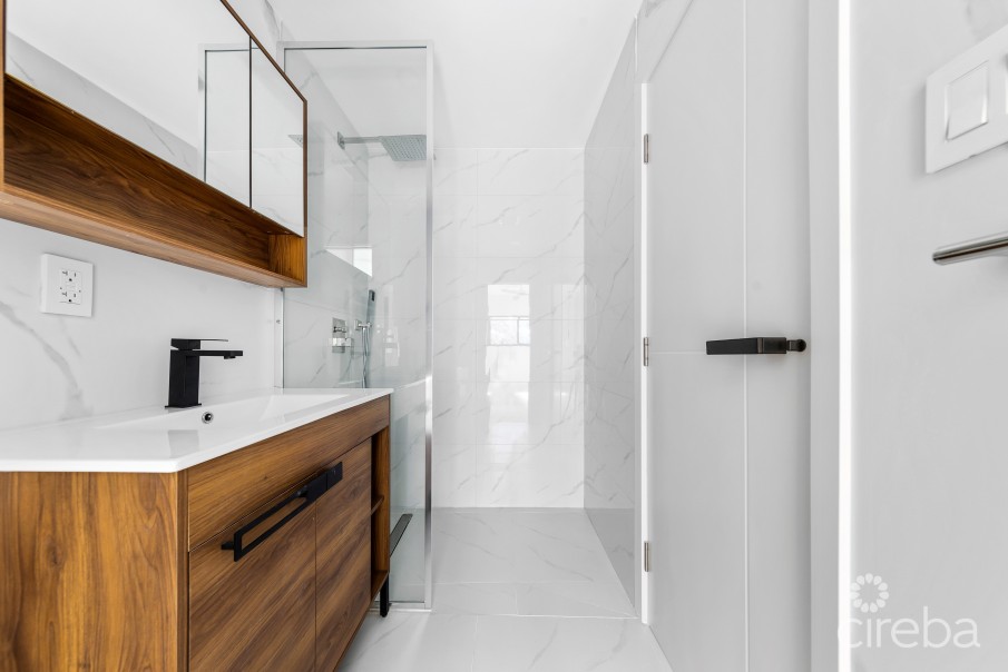 ARZA WEST BAY I5. 1- BED END UNIT. MOVE-IN READY - INCLUSIVE OF A CI$ 14,000 FURNITURE PACKAGE - Image 6
