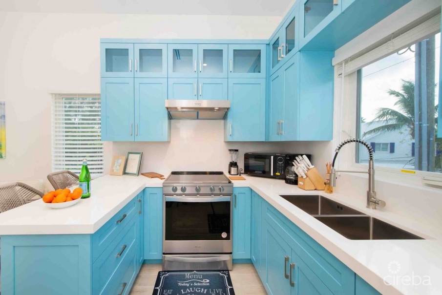 CARIB SUN - EXQUISITE WATERFRONT ESTATE W /GUESTHOUSE IN CAYMAN KAI - Image 41