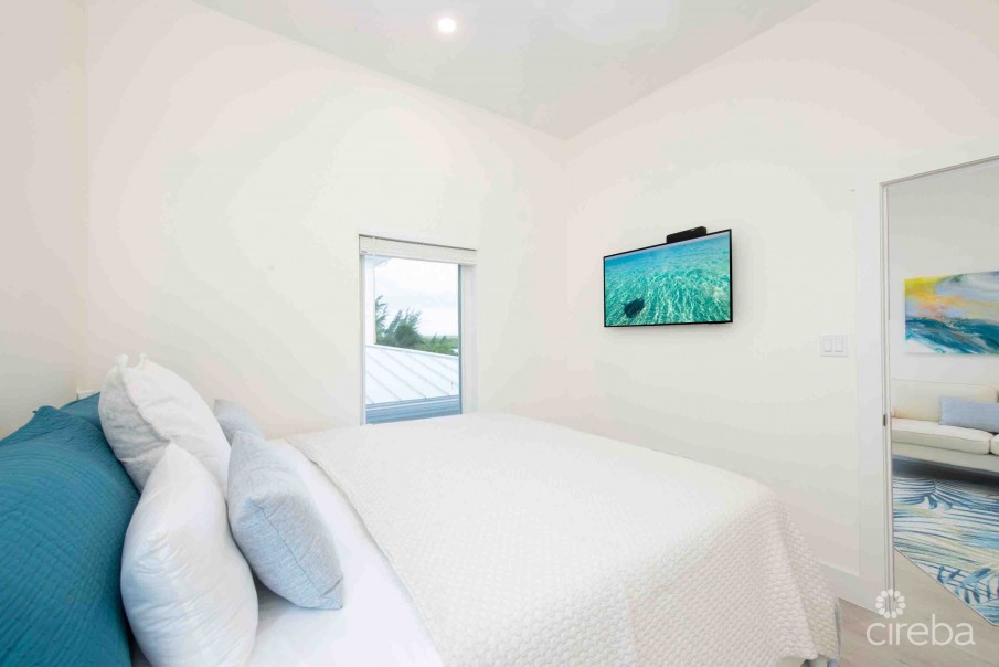 CARIB SUN - EXQUISITE WATERFRONT ESTATE W /GUESTHOUSE IN CAYMAN KAI - Image 40