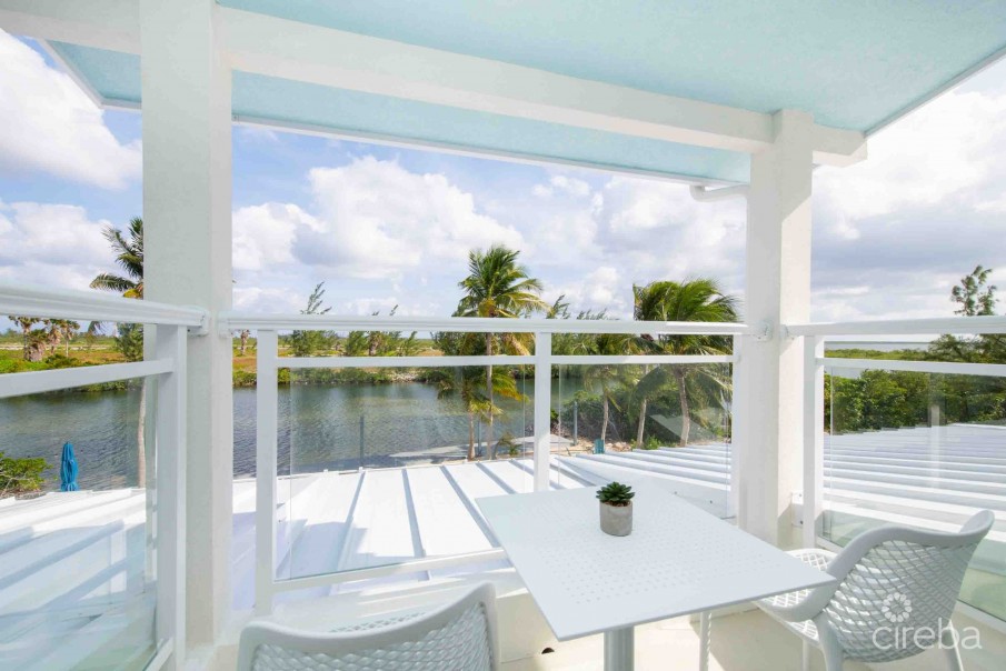 CARIB SUN - EXQUISITE WATERFRONT ESTATE W /GUESTHOUSE IN CAYMAN KAI - Image 28