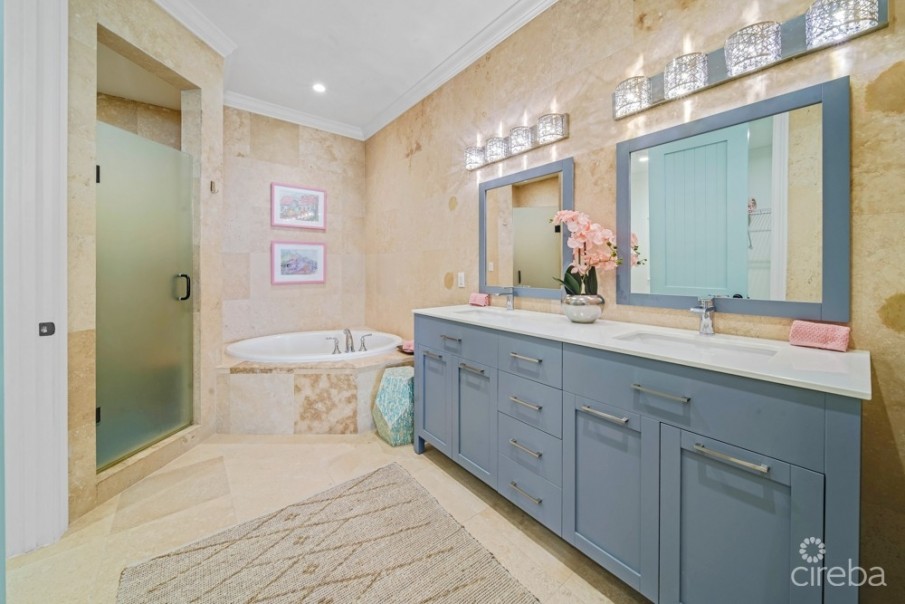 KISHA 104 | 2 BDRM WATERFRONT WALKOUT – COASTAL ELEGANCE & LUXURY - Image 1