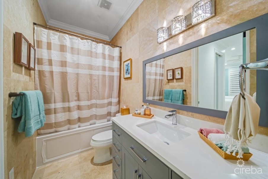 KISHA 104 | 2 BDRM WATERFRONT WALKOUT – COASTAL ELEGANCE & LUXURY - Image 13