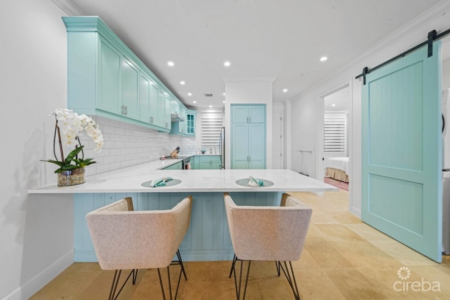 KISHA 104 | 2 BDRM WATERFRONT WALKOUT – COASTAL ELEGANCE & LUXURY - Image 4