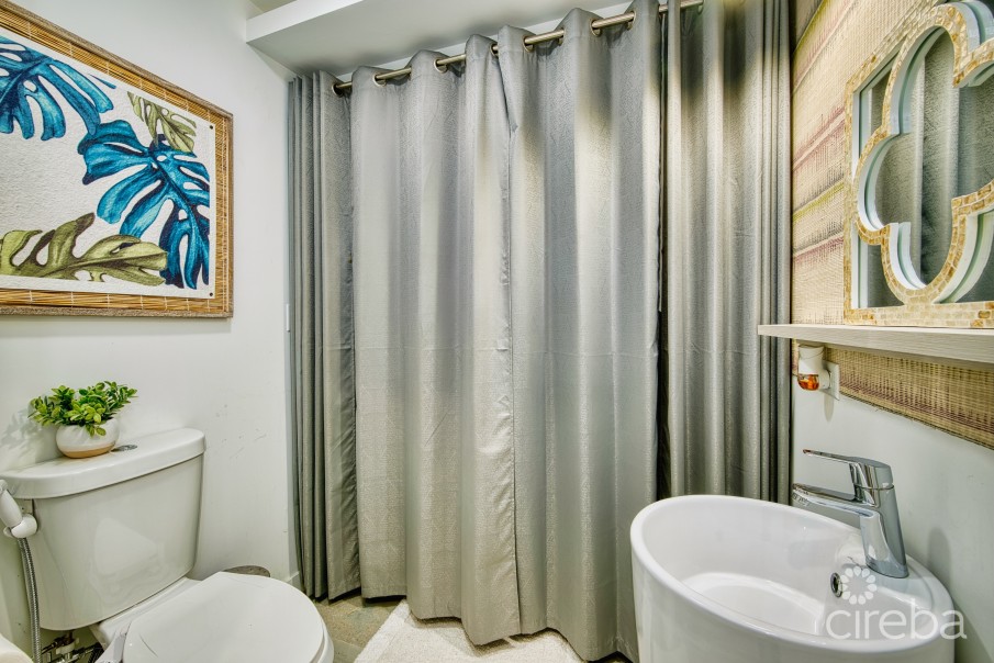 LIGHTHOUSE MANOR #6- CHIC 1-BEDROOM TOWNHOME IN GATED WEST BAY COMMUNITY - Image 6