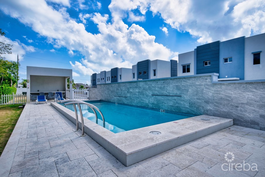 LIGHTHOUSE MANOR #6- CHIC 1-BEDROOM TOWNHOME IN GATED WEST BAY COMMUNITY - Image 4