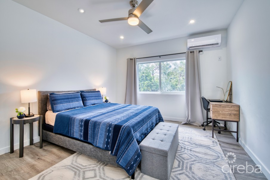 LIGHTHOUSE MANOR #6- CHIC 1-BEDROOM TOWNHOME IN GATED WEST BAY COMMUNITY - Image 2