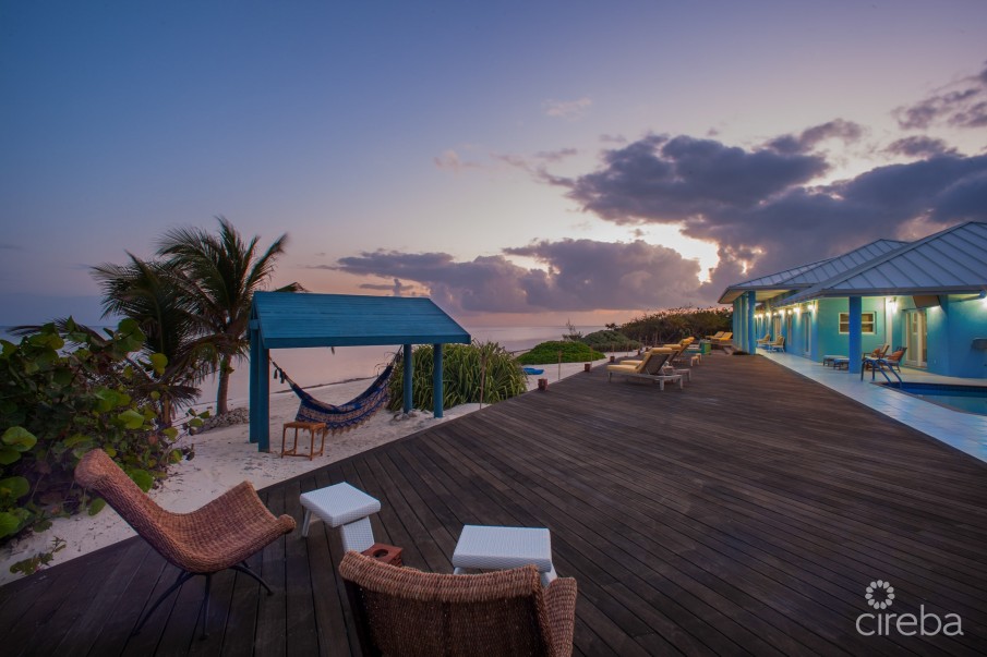 LITTLE CAYMAN BEACHFRONT HOME WITH 2 LOTS AND POOL - Image 1