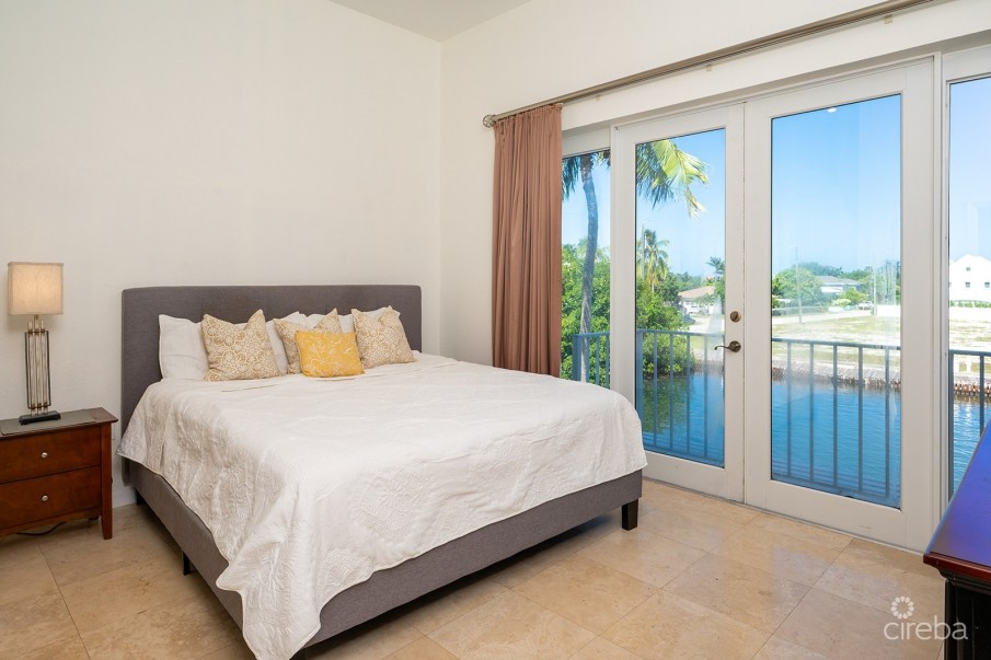 OLIVIA’S COVE #6 | GOVERNORS HARBOUR | CANAL FRONT CONDO - Image 11