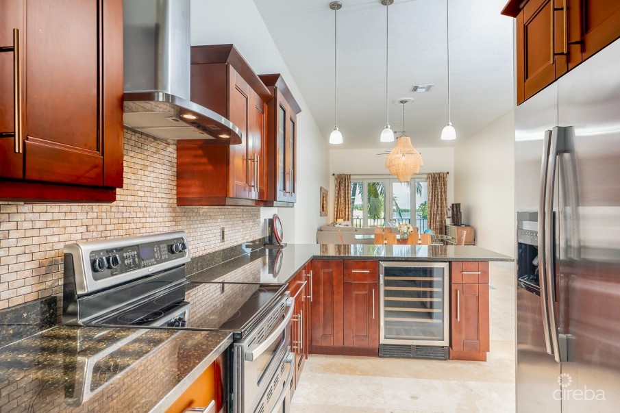 OLIVIA’S COVE #6 | GOVERNORS HARBOUR | CANAL FRONT CONDO - Image 5