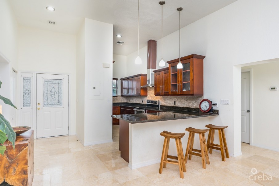 OLIVIA’S COVE #6 | GOVERNORS HARBOUR | CANAL FRONT CONDO - Image 3