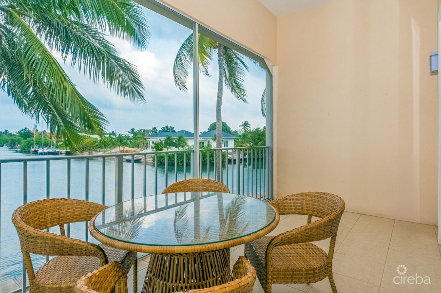 OLIVIA’S COVE #6 | GOVERNORS HARBOUR | CANAL FRONT CONDO - Image 9
