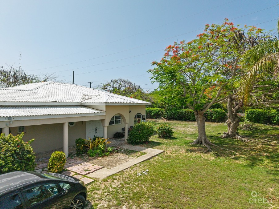 RE-DEVELOPMENT OPPORTUNITY - FIXER UPPER ON .70 ACRES - Image 2