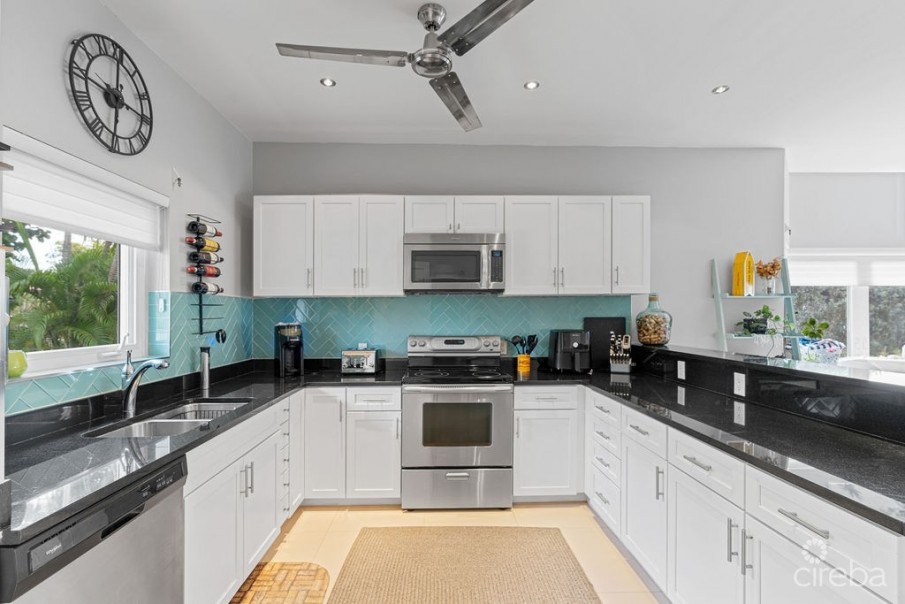 THE GRANGE 1, SNUG HARBOUR TOWNHOME - Image 1