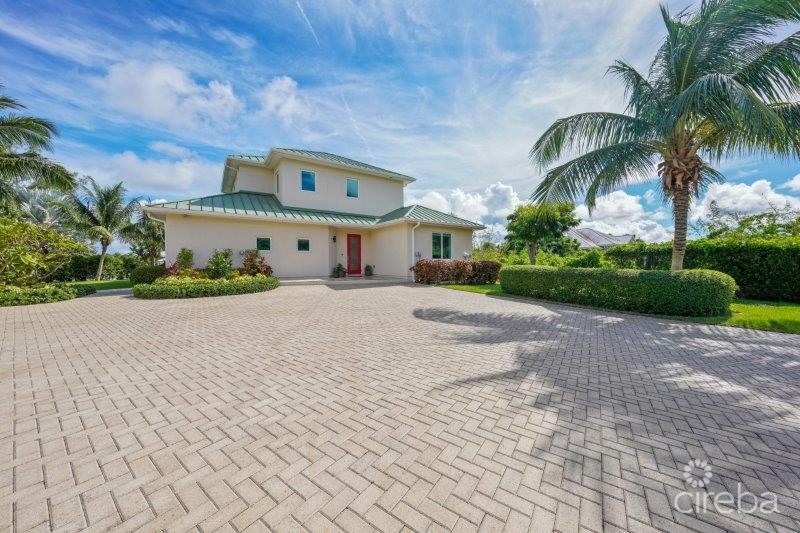 UNIQUE PATRICK’S ISLAND CANAL FRONT HOME WITH GUEST HOUSE AND 3 CAR GARAGE - SOON TO BE GATED! - Image 1