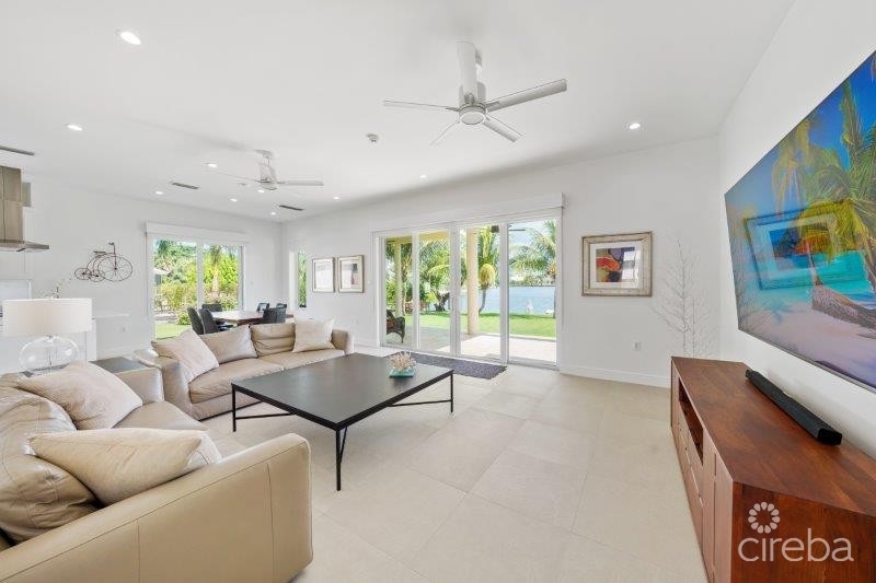 UNIQUE PATRICK’S ISLAND CANAL FRONT HOME WITH GUEST HOUSE AND 3 CAR GARAGE - SOON TO BE GATED!