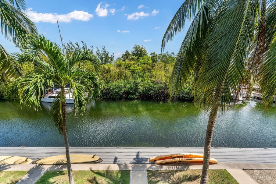 UPGRADED COASTAL ESCAPE CANAL FRONT TOWNHOUSE - Image 21