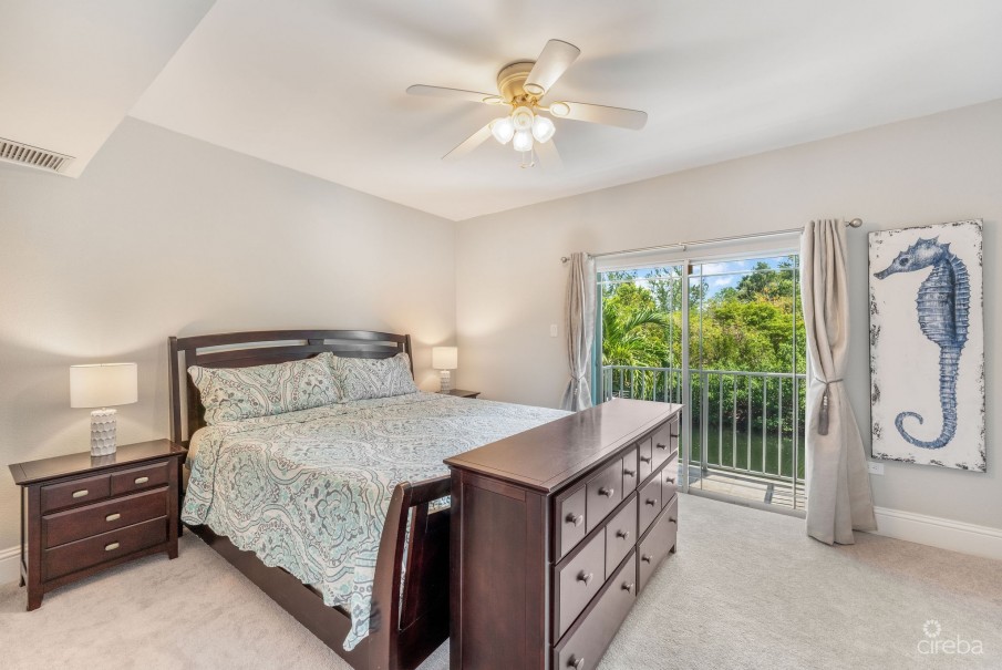 UPGRADED COASTAL ESCAPE CANAL FRONT TOWNHOUSE - Image 15
